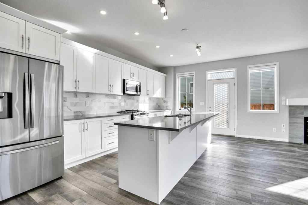 MLS® A2259894 - 64 Carrington Crescent NW in Carrington Calgary, Residential
