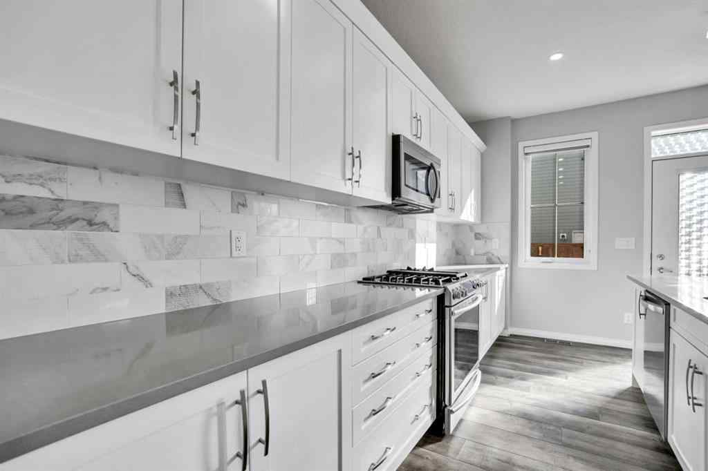 MLS® A2259894 - 64 Carrington Crescent NW in Carrington Calgary, Residential