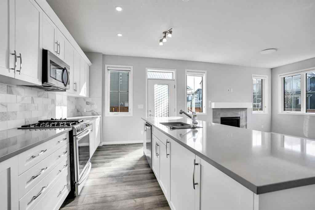 MLS® A2259894 - 64 Carrington Crescent NW in Carrington Calgary, Residential