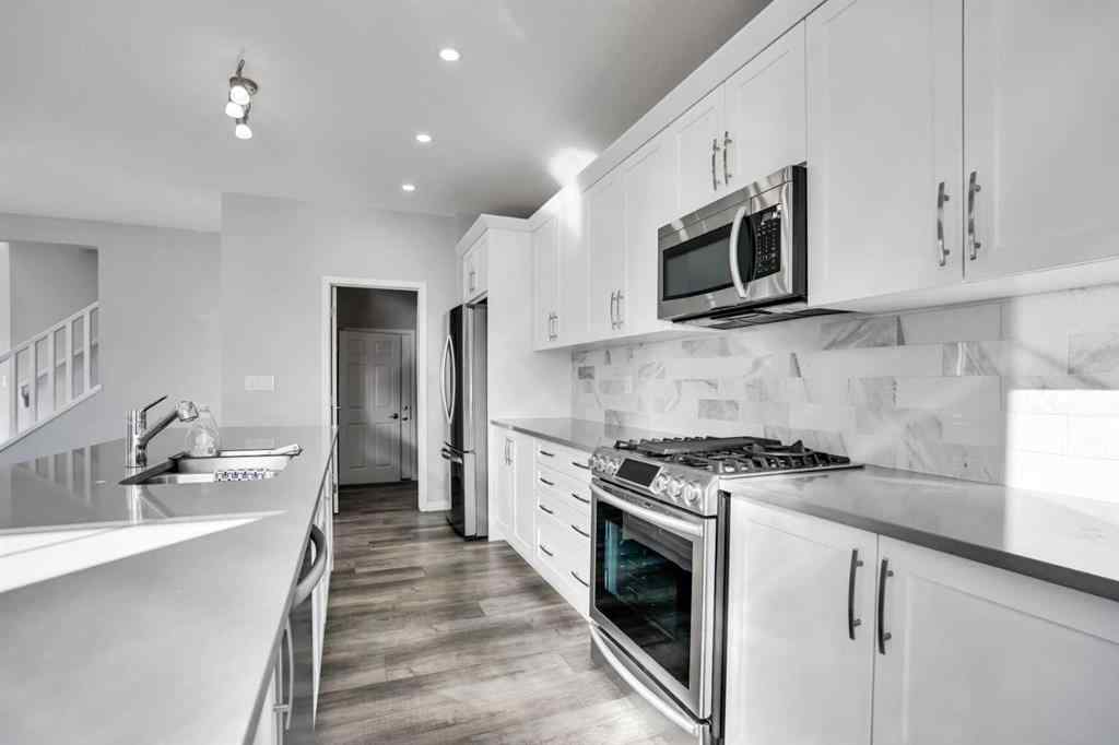 MLS® A2259894 - 64 Carrington Crescent NW in Carrington Calgary, Residential
