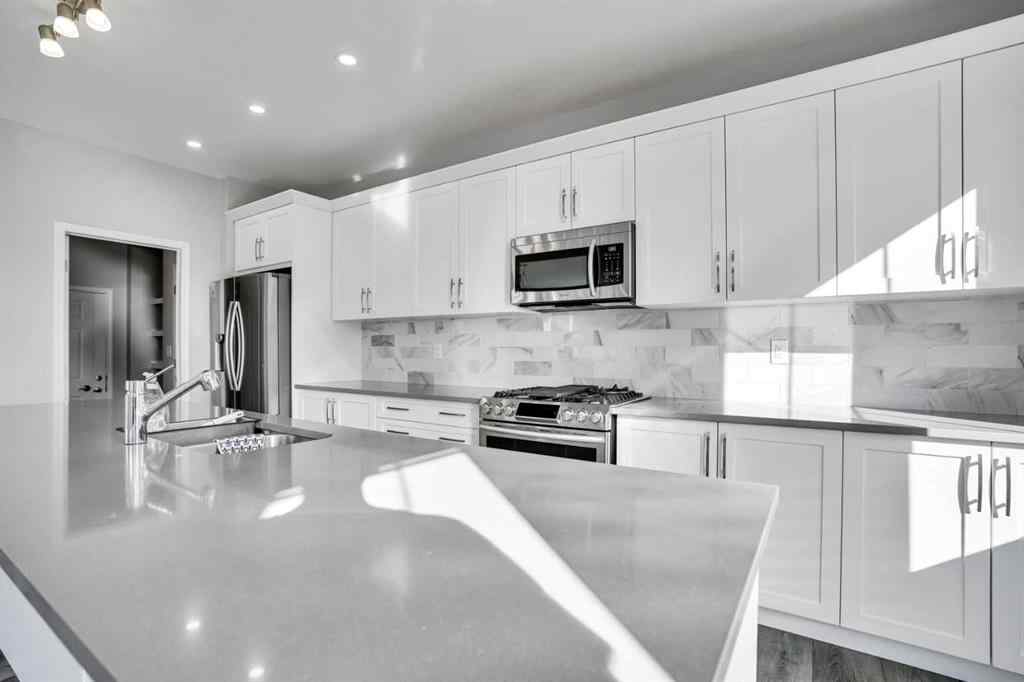 MLS® A2259894 - 64 Carrington Crescent NW in Carrington Calgary, Residential