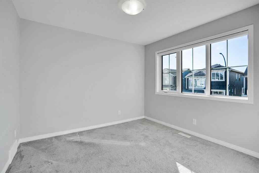 MLS® A2259894 - 64 Carrington Crescent NW in Carrington Calgary, Residential