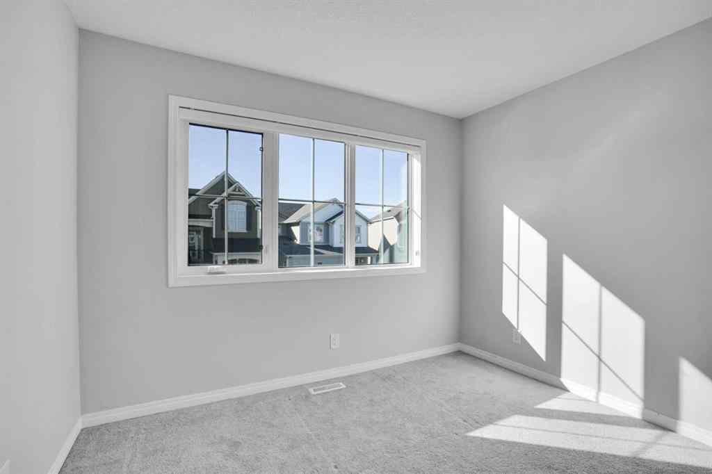 MLS® A2259894 - 64 Carrington Crescent NW in Carrington Calgary, Residential