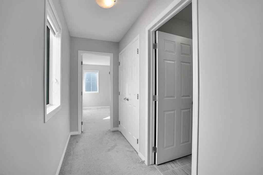 MLS® A2259894 - 64 Carrington Crescent NW in Carrington Calgary, Residential