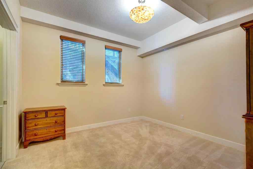 MLS® A2259895 - Unit #203 901 8th Avenue  in Town Centre_Canmore Canmore, Residential