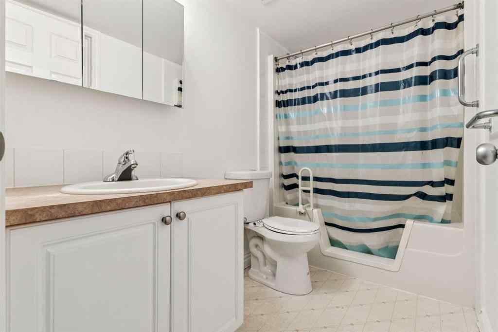 MLS® A2259896 - Unit #209 5555 Falsbridge Drive NE in Falconridge Calgary, Residential