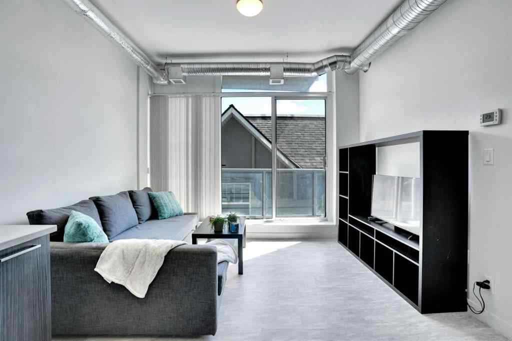 MLS® A2259903 - Unit #405 624 8 Avenue SE in Downtown East Village Calgary, Residential