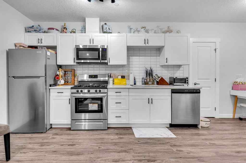 MLS® A2259921 - 21 Lucas Rise NW in Livingston Calgary, Residential