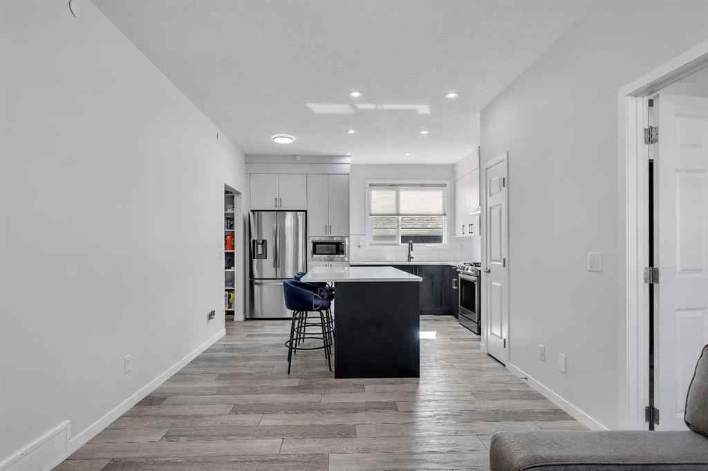 MLS® A2259921 - 21 Lucas Rise NW in Livingston Calgary, Residential