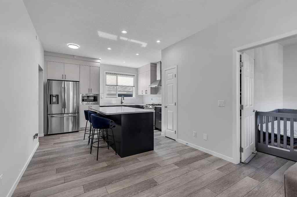 MLS® A2259921 - 21 Lucas Rise NW in Livingston Calgary, Residential