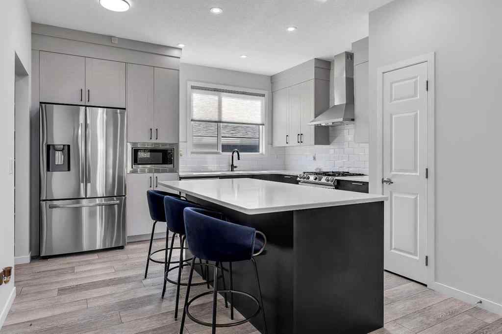 MLS® A2259921 - 21 Lucas Rise NW in Livingston Calgary, Residential