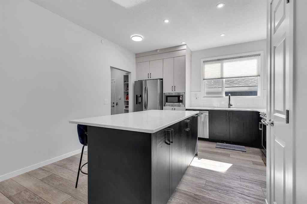 MLS® A2259921 - 21 Lucas Rise NW in Livingston Calgary, Residential