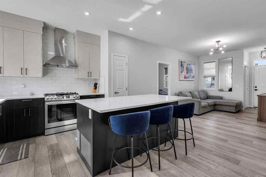 MLS® A2259921 - 21 Lucas Rise NW in Livingston Calgary, Residential