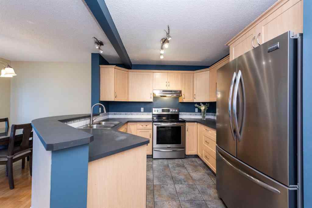 MLS® A2259925 - 49 Rocky Ridge Heath NW in Rocky Ridge Calgary, Residential