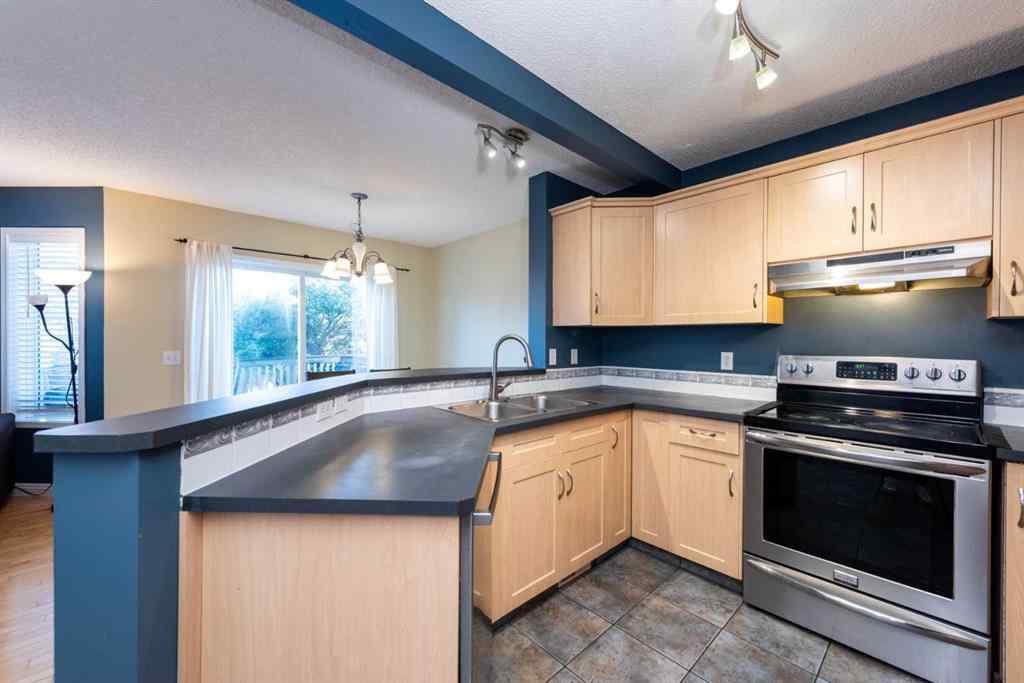MLS® A2259925 - 49 Rocky Ridge Heath NW in Rocky Ridge Calgary, Residential