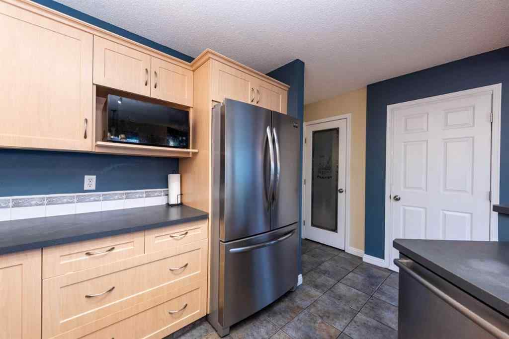 MLS® A2259925 - 49 Rocky Ridge Heath NW in Rocky Ridge Calgary, Residential