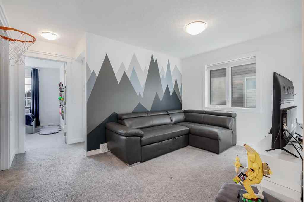 MLS® A2259934 - 629 Reynolds Crescent SW in Coopers Crossing Airdrie, Residential