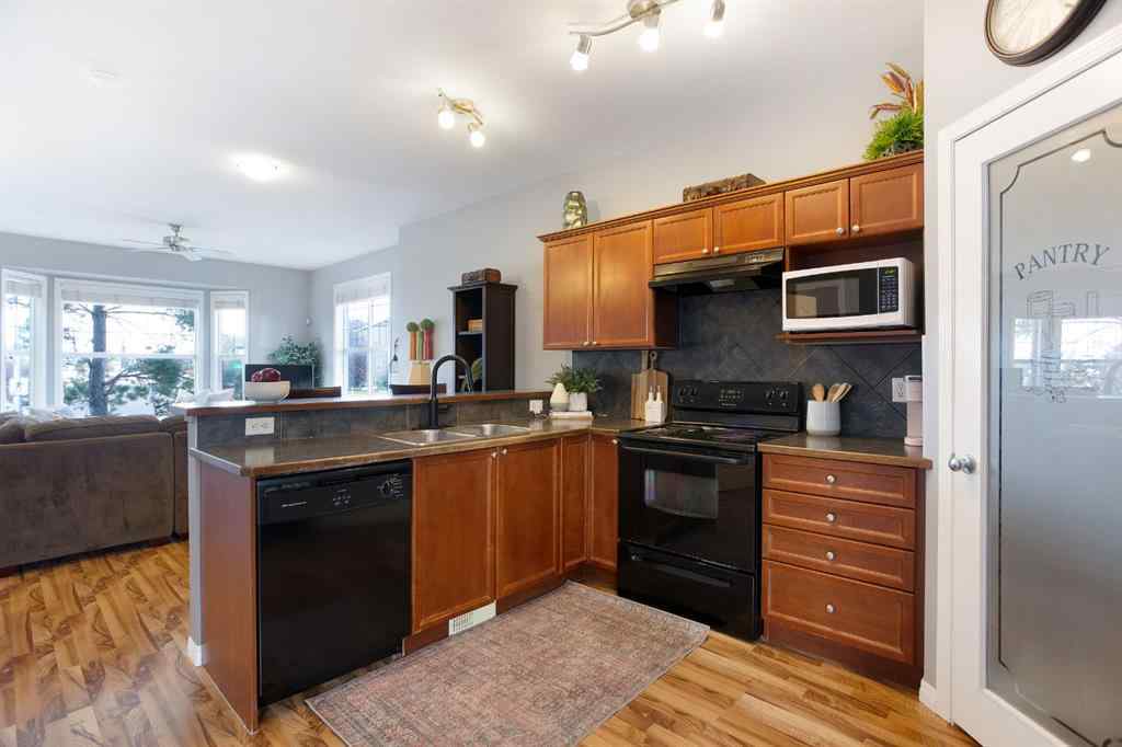 MLS® A2259939 - Unit #404 703 Luxstone Square SW in Luxstone Airdrie, Residential