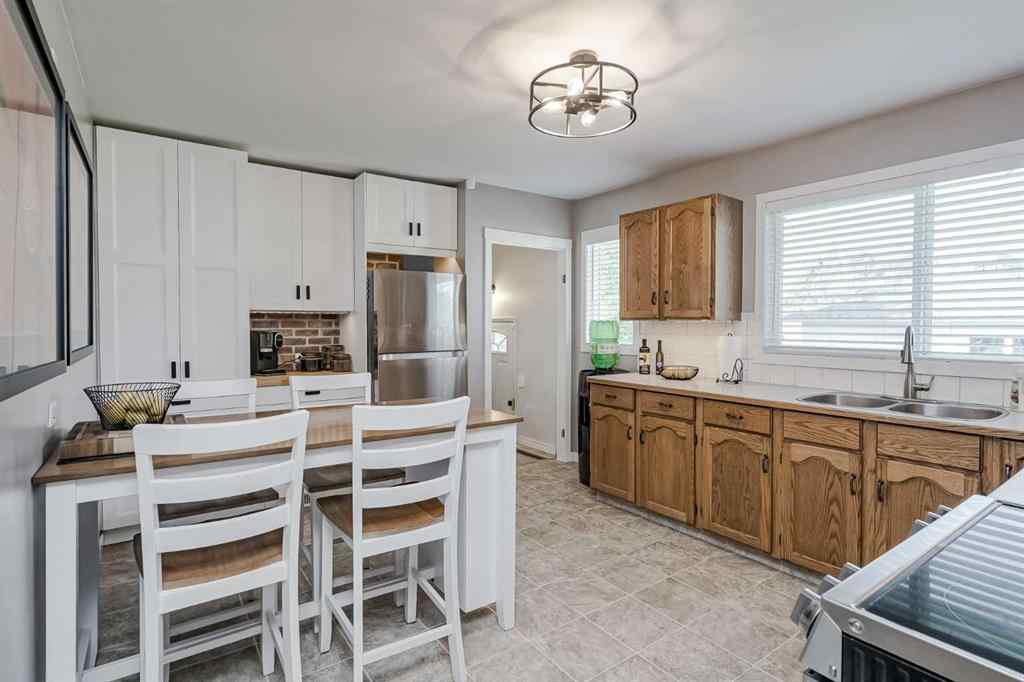 MLS® A2259946 - 1813 38 Street SE in Forest Lawn Calgary, Residential