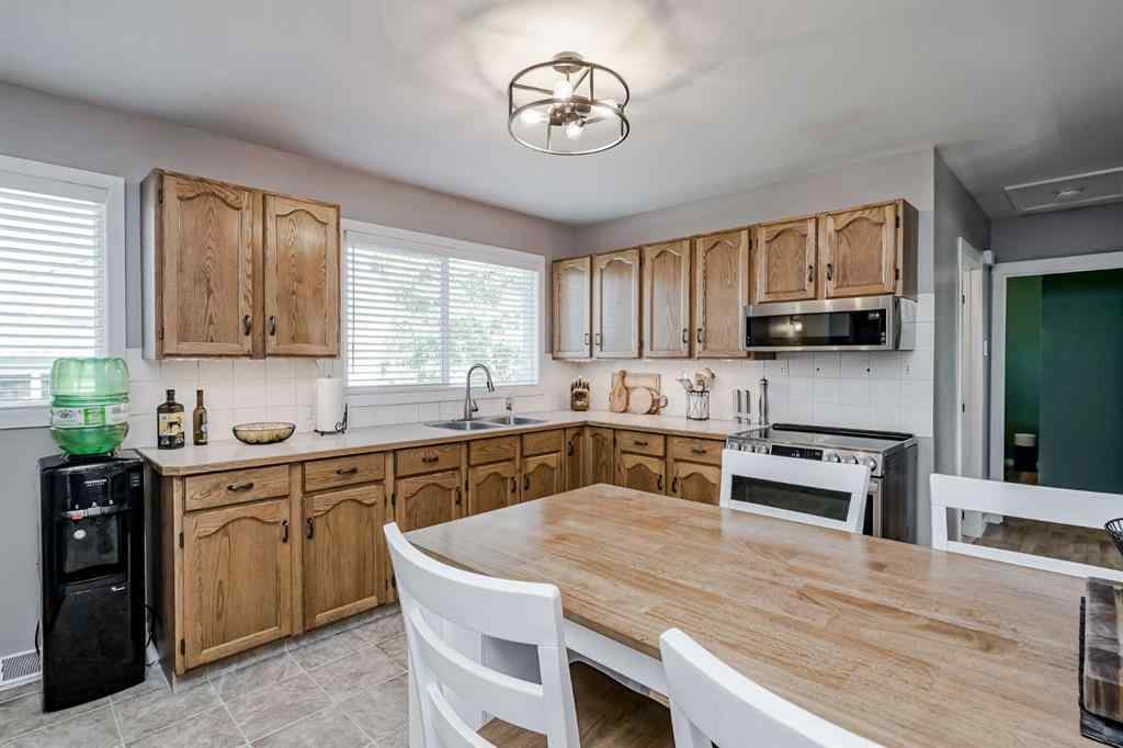 MLS® A2259946 - 1813 38 Street SE in Forest Lawn Calgary, Residential