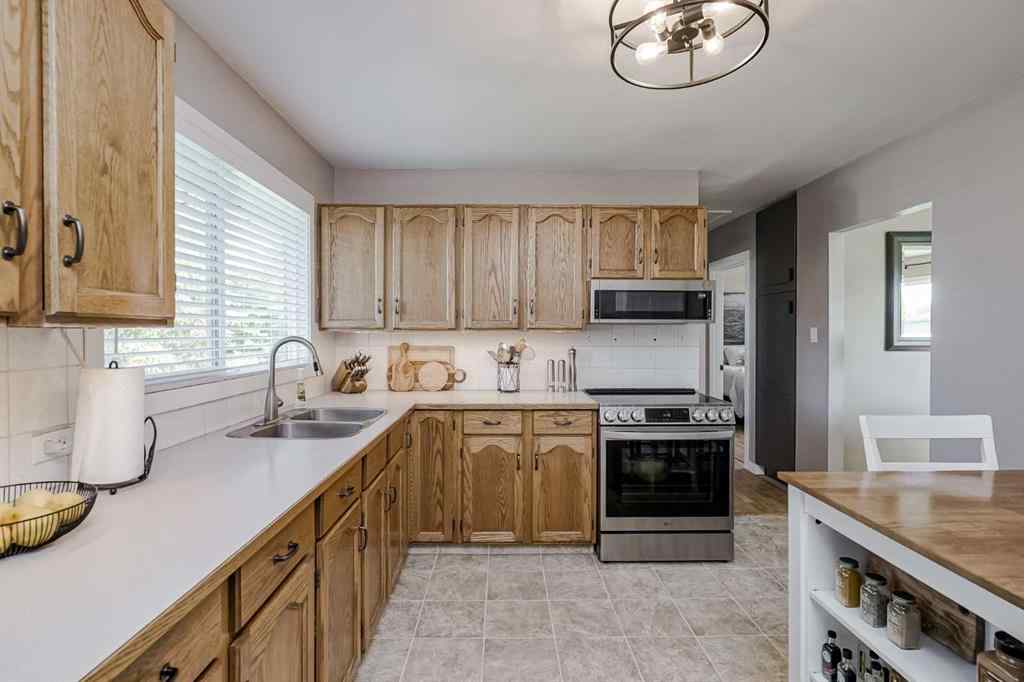 MLS® A2259946 - 1813 38 Street SE in Forest Lawn Calgary, Residential