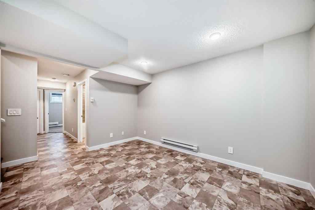 MLS® A2259951 - 157 Belmont Drive SW in Belmont Calgary, Residential