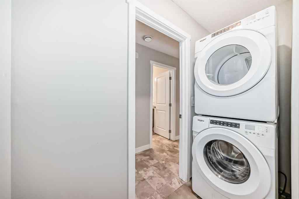 MLS® A2259951 - 157 Belmont Drive SW in Belmont Calgary, Residential