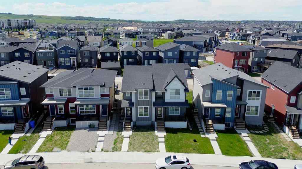 MLS® A2259951 - 157 Belmont Drive SW in Belmont Calgary, Residential