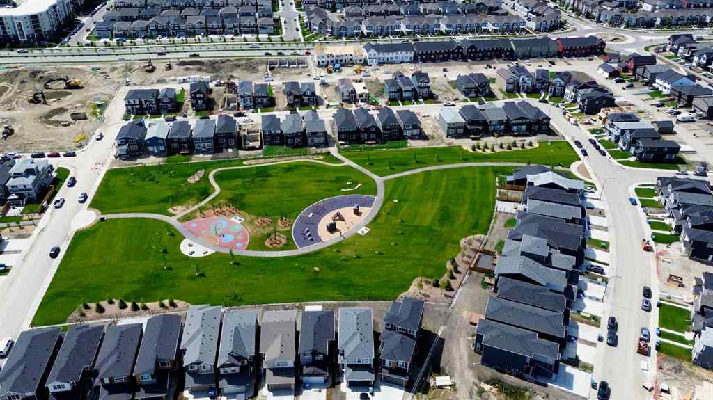 MLS® A2259951 - 157 Belmont Drive SW in Belmont Calgary, Residential