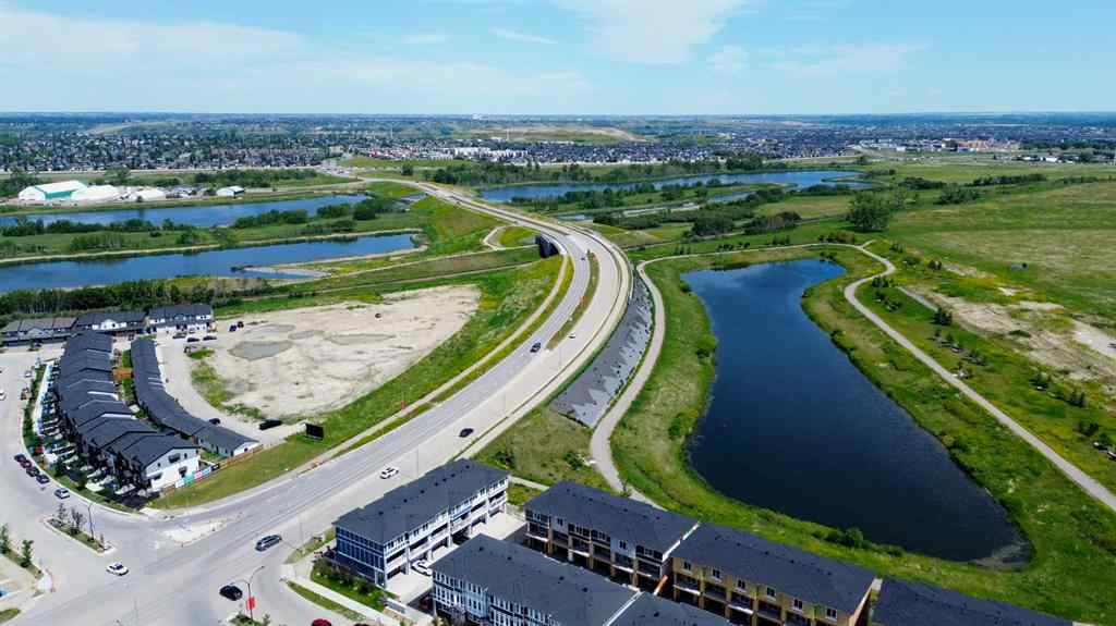 MLS® A2259951 - 157 Belmont Drive SW in Belmont Calgary, Residential