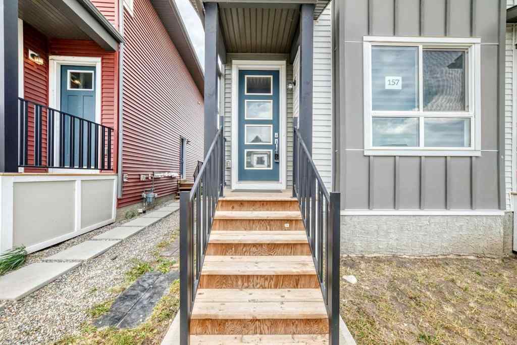 MLS® A2259951 - 157 Belmont Drive SW in Belmont Calgary, Residential
