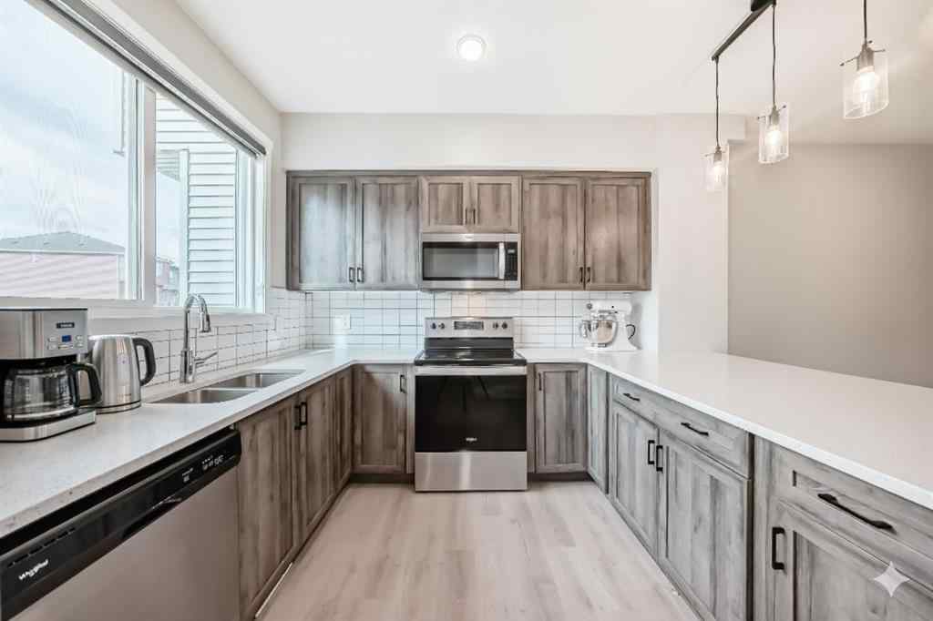 MLS® A2259951 - 157 Belmont Drive SW in Belmont Calgary, Residential