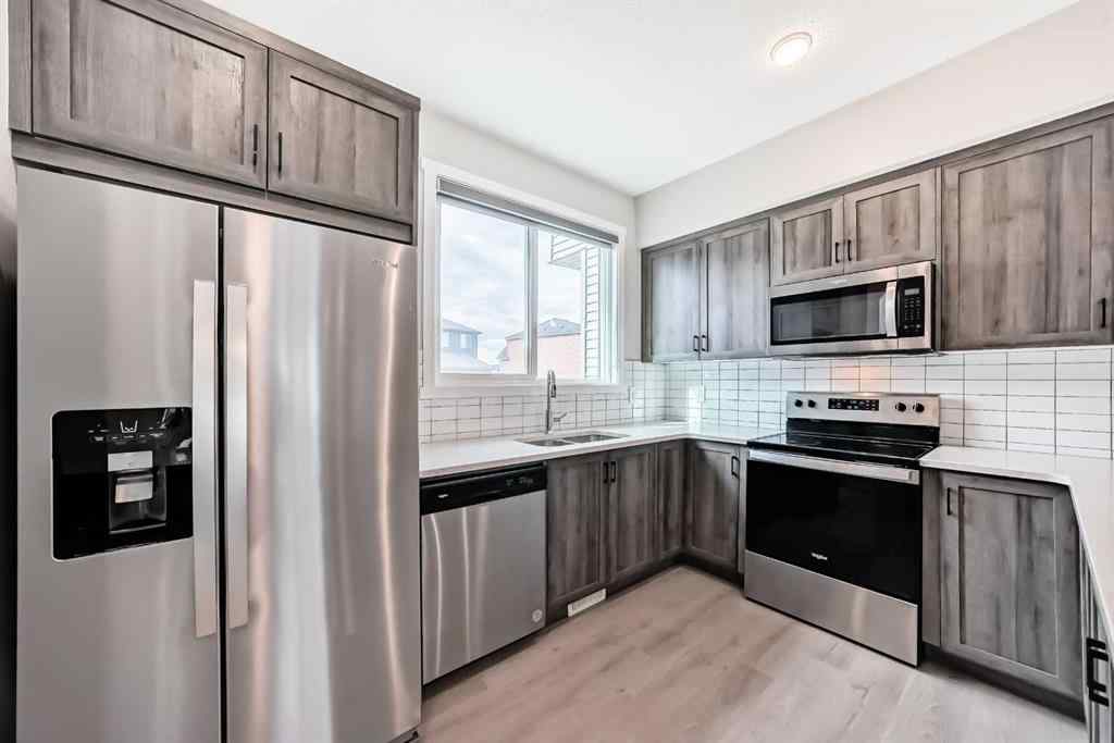MLS® A2259951 - 157 Belmont Drive SW in Belmont Calgary, Residential