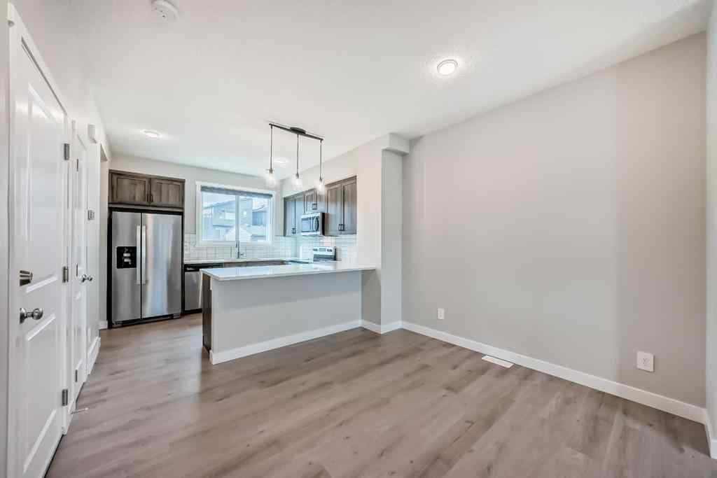 MLS® A2259951 - 157 Belmont Drive SW in Belmont Calgary, Residential