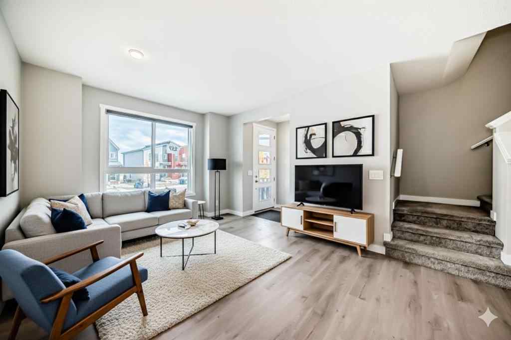 MLS® A2259951 - 157 Belmont Drive SW in Belmont Calgary, Residential