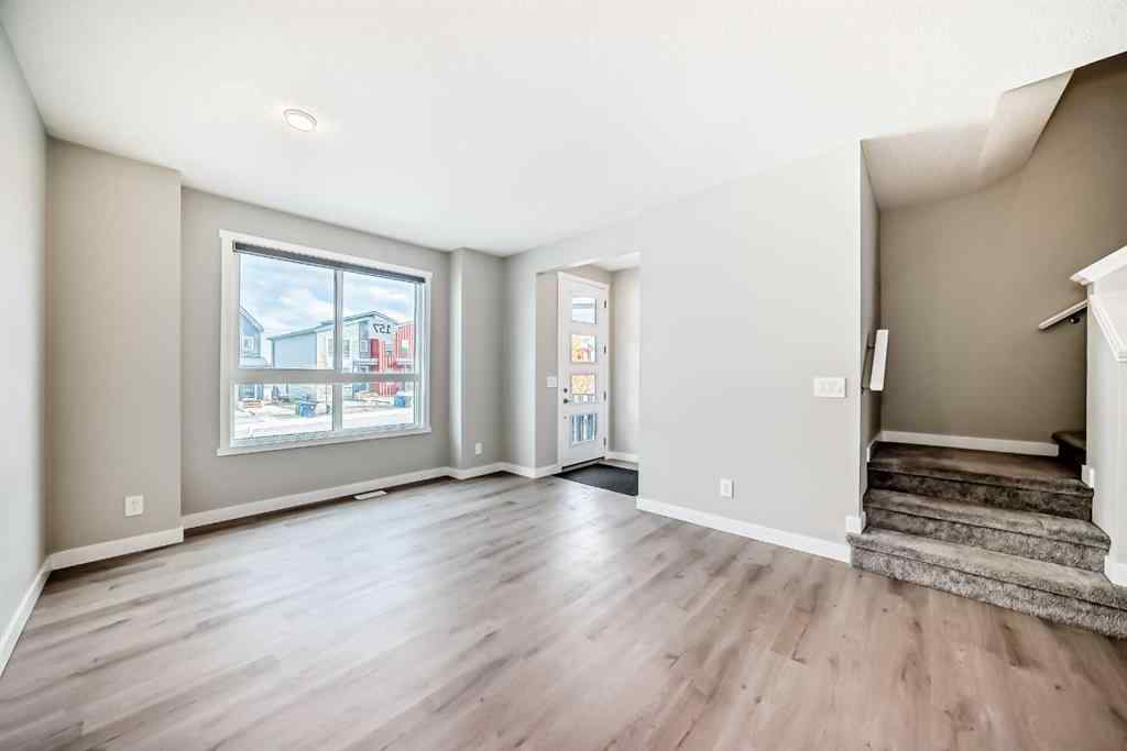 MLS® A2259951 - 157 Belmont Drive SW in Belmont Calgary, Residential