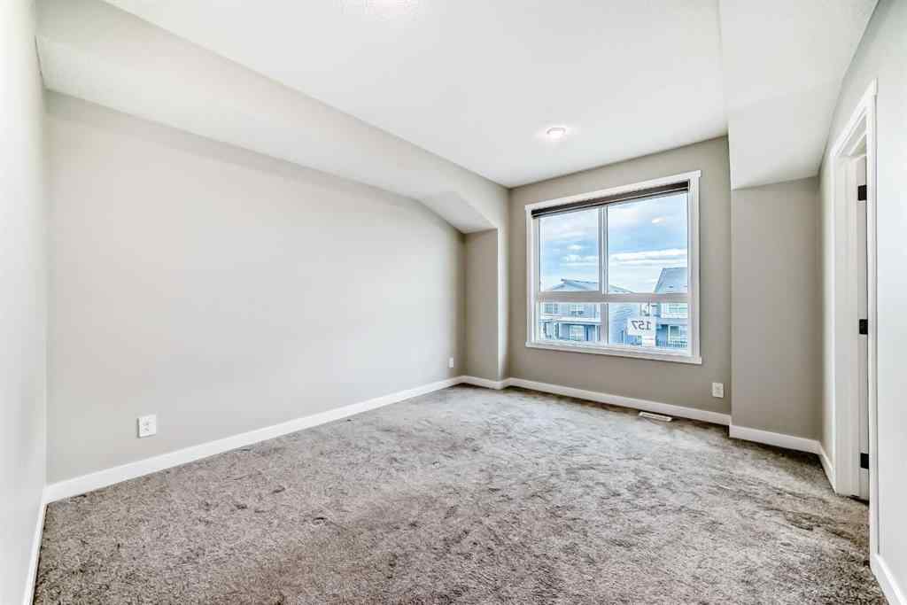 MLS® A2259951 - 157 Belmont Drive SW in Belmont Calgary, Residential