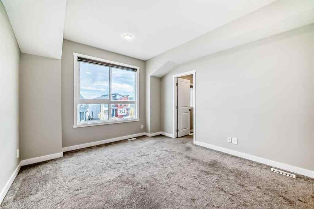 MLS® A2259951 - 157 Belmont Drive SW in Belmont Calgary, Residential