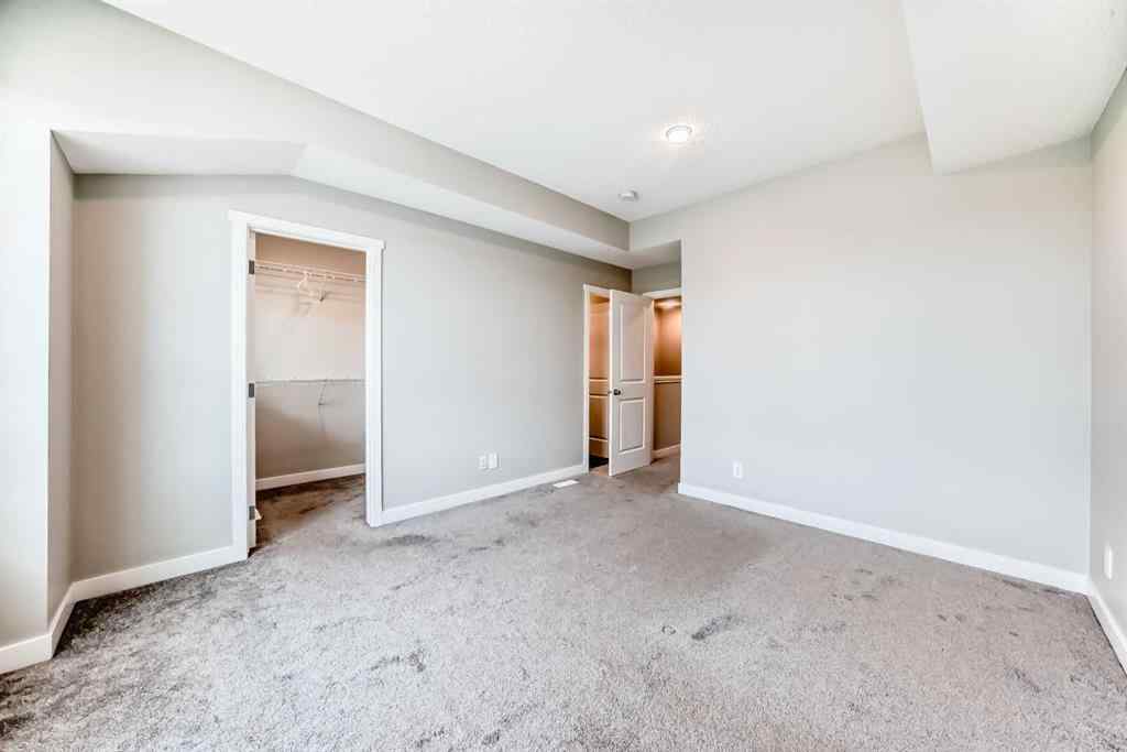 MLS® A2259951 - 157 Belmont Drive SW in Belmont Calgary, Residential