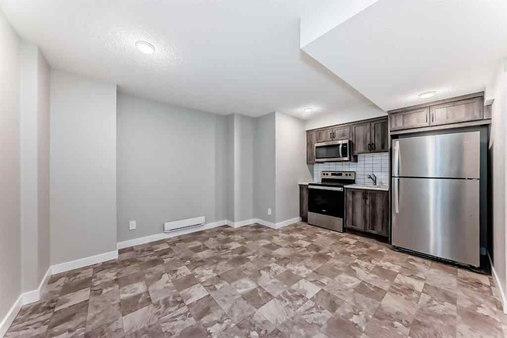 MLS® A2259951 - 157 Belmont Drive SW in Belmont Calgary, Residential