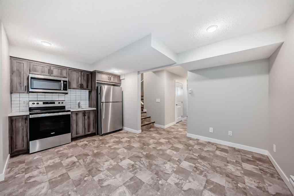 MLS® A2259951 - 157 Belmont Drive SW in Belmont Calgary, Residential