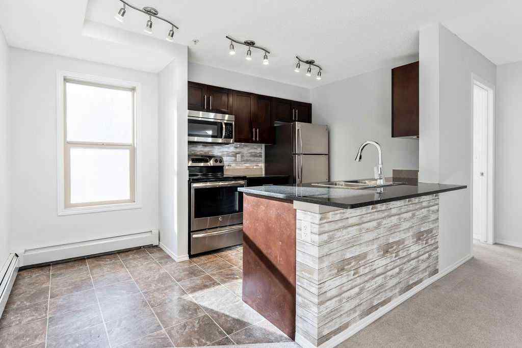 MLS® A2259958 - Unit #9113 403 Mackenzie Way SW in Downtown Airdrie, Residential