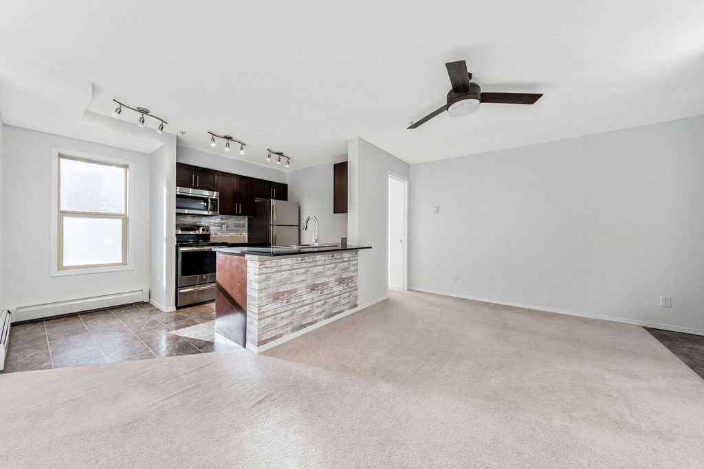 MLS® A2259958 - Unit #9113 403 Mackenzie Way SW in Downtown Airdrie, Residential