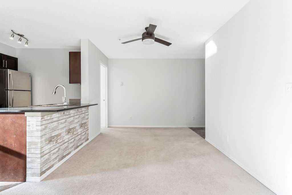 MLS® A2259958 - Unit #9113 403 Mackenzie Way SW in Downtown Airdrie, Residential