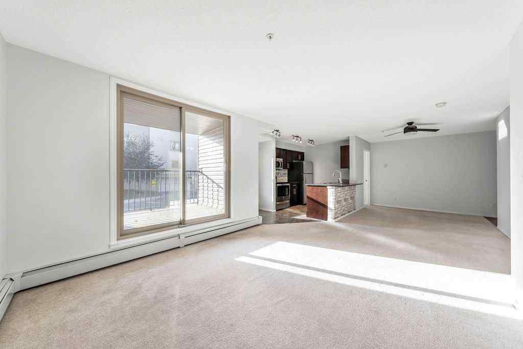 MLS® A2259958 - Unit #9113 403 Mackenzie Way SW in Downtown Airdrie, Residential