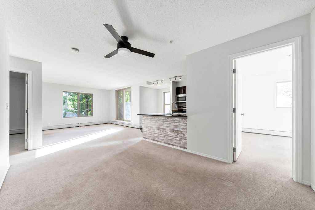 MLS® A2259958 - Unit #9113 403 Mackenzie Way SW in Downtown Airdrie, Residential