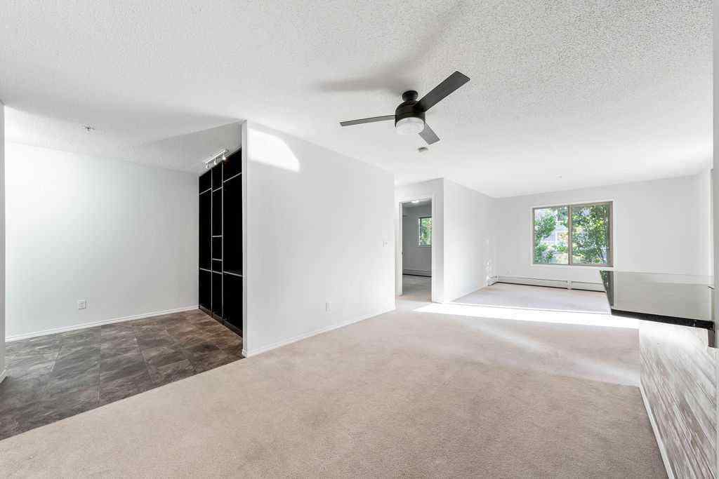 MLS® A2259958 - Unit #9113 403 Mackenzie Way SW in Downtown Airdrie, Residential