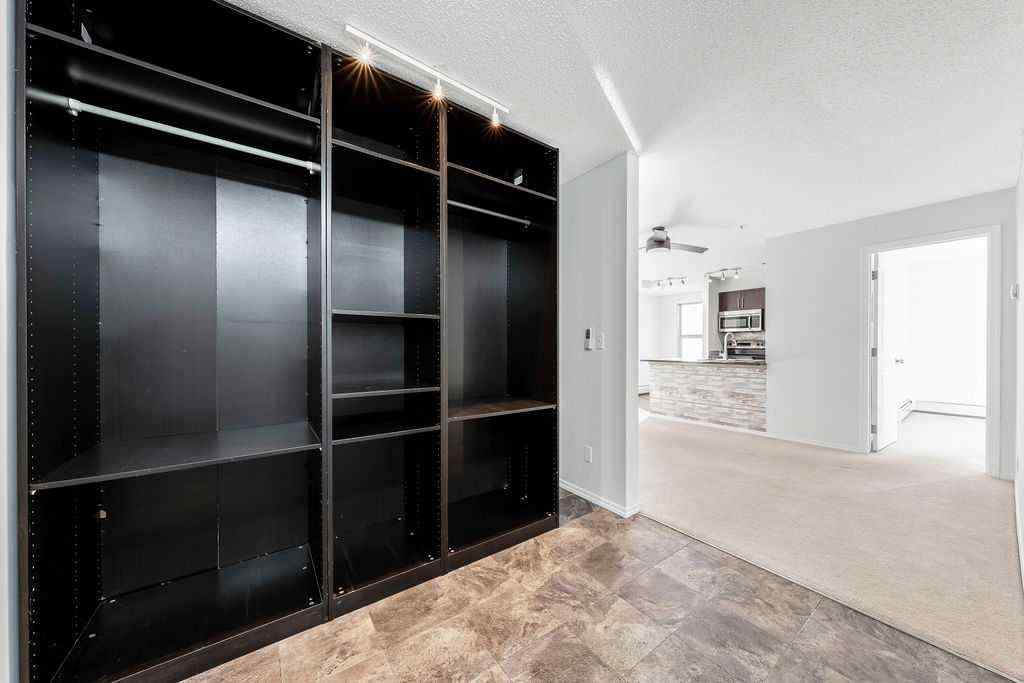 MLS® A2259958 - Unit #9113 403 Mackenzie Way SW in Downtown Airdrie, Residential