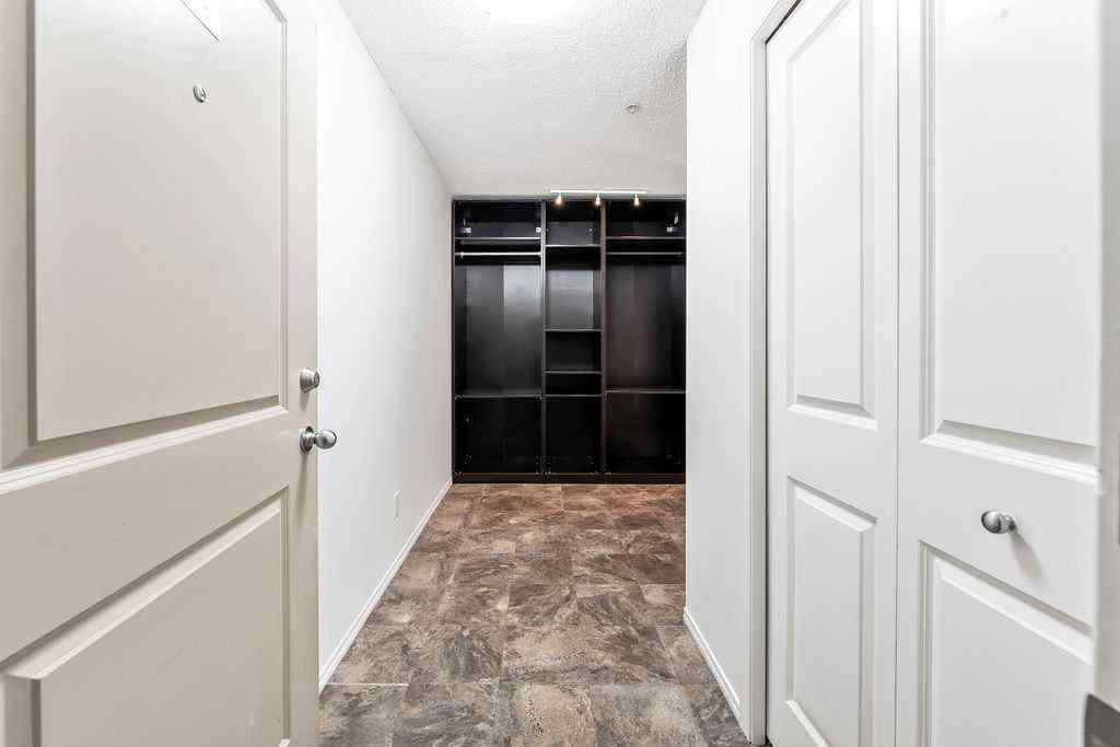 MLS® A2259958 - Unit #9113 403 Mackenzie Way SW in Downtown Airdrie, Residential
