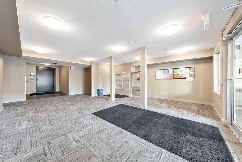 MLS® A2259958 - Unit #9113 403 Mackenzie Way SW in Downtown Airdrie, Residential